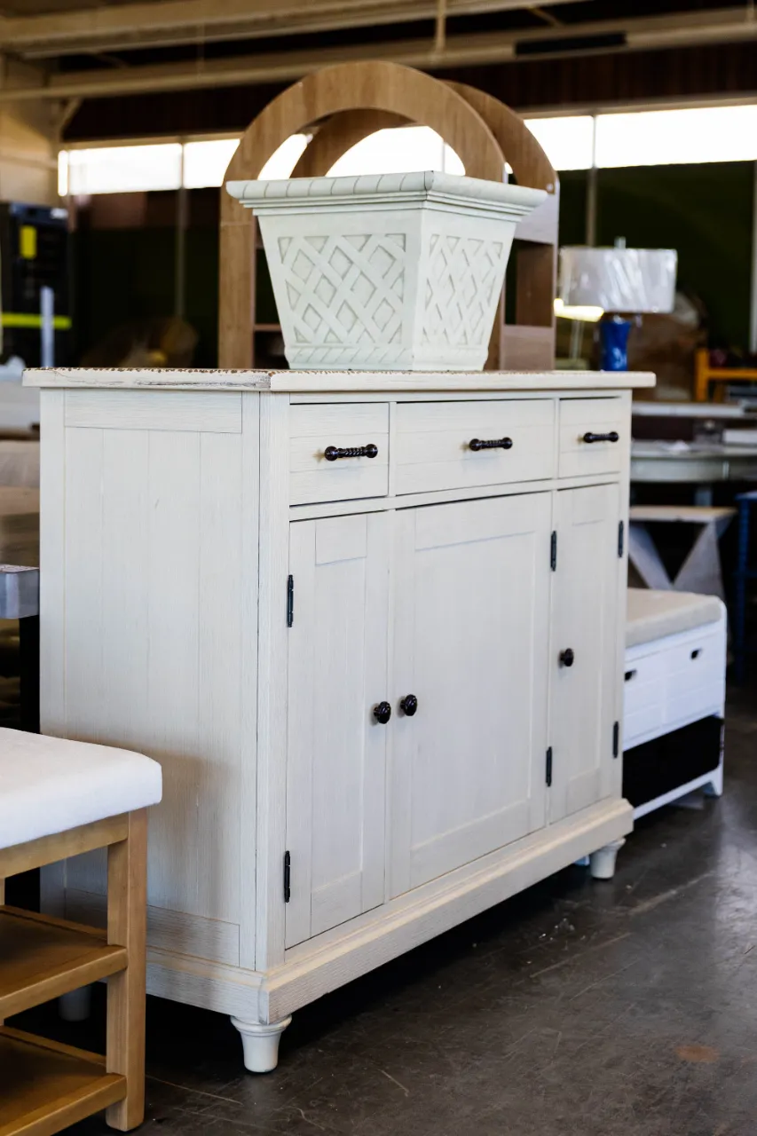 Distressed White Wood Cabinet with Drawers and Doors โ image 1